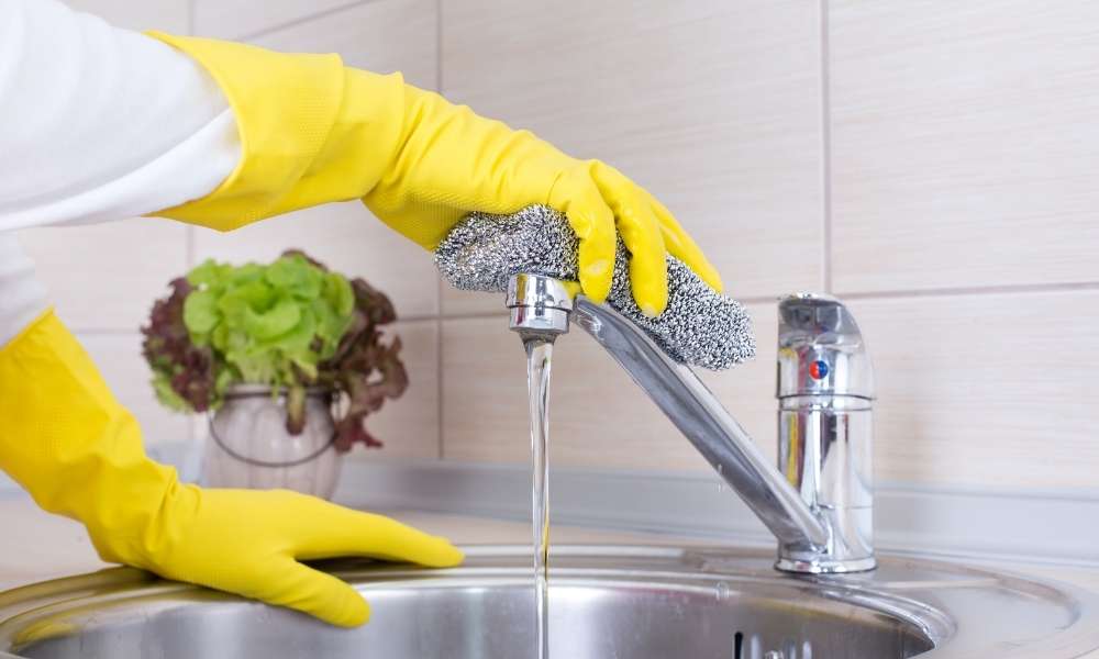 How to clean kitchen faucet head