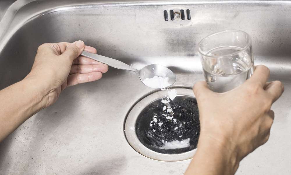 Use Vinegar And Baking Soda To Unclog A Double Kitchen Sink With Standing Water 