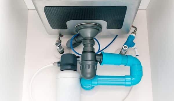 Insert A PVC Pipe to vent A Kitchen Sink 