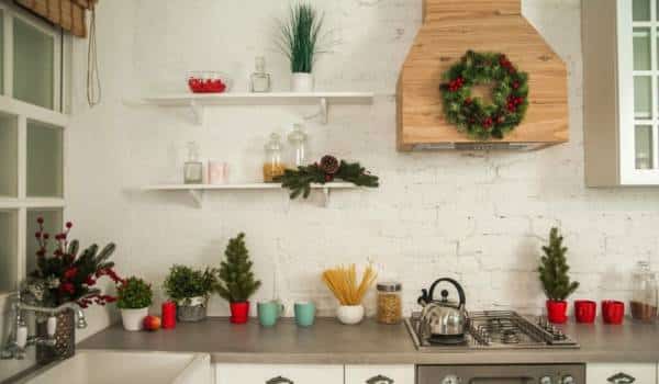 Using Upside-down Command Hooks To Hang Wreaths on Kitchen Cabinets