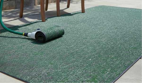 Tips for preventing mold on outdoor carpet, including proper storage and mold-resistant sprays